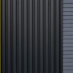 a black and yellow door with a yellow stripe