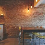 brown wooden dining table near white and brown mini bar